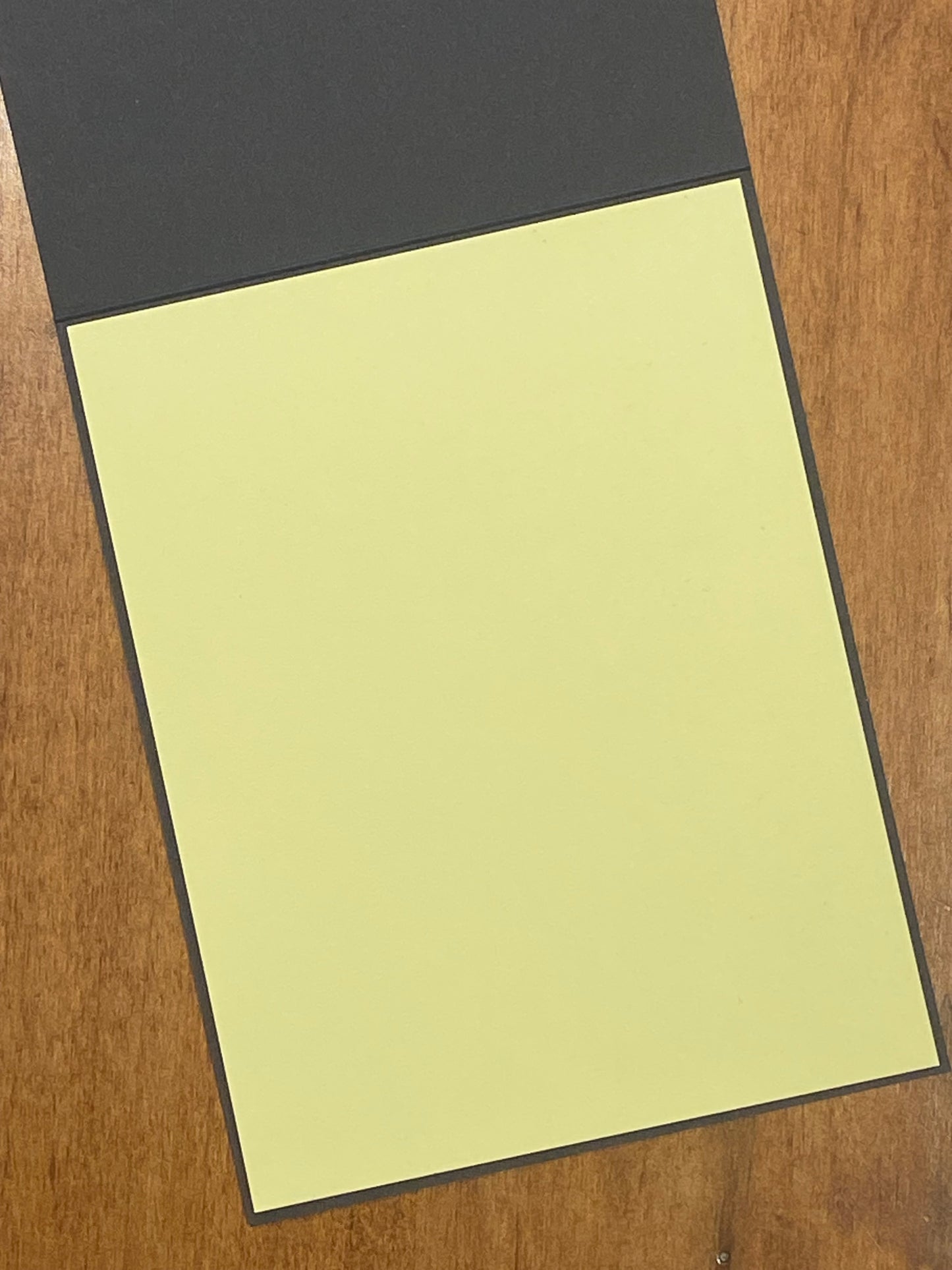 The black note card has a light yellow panel inside for your message