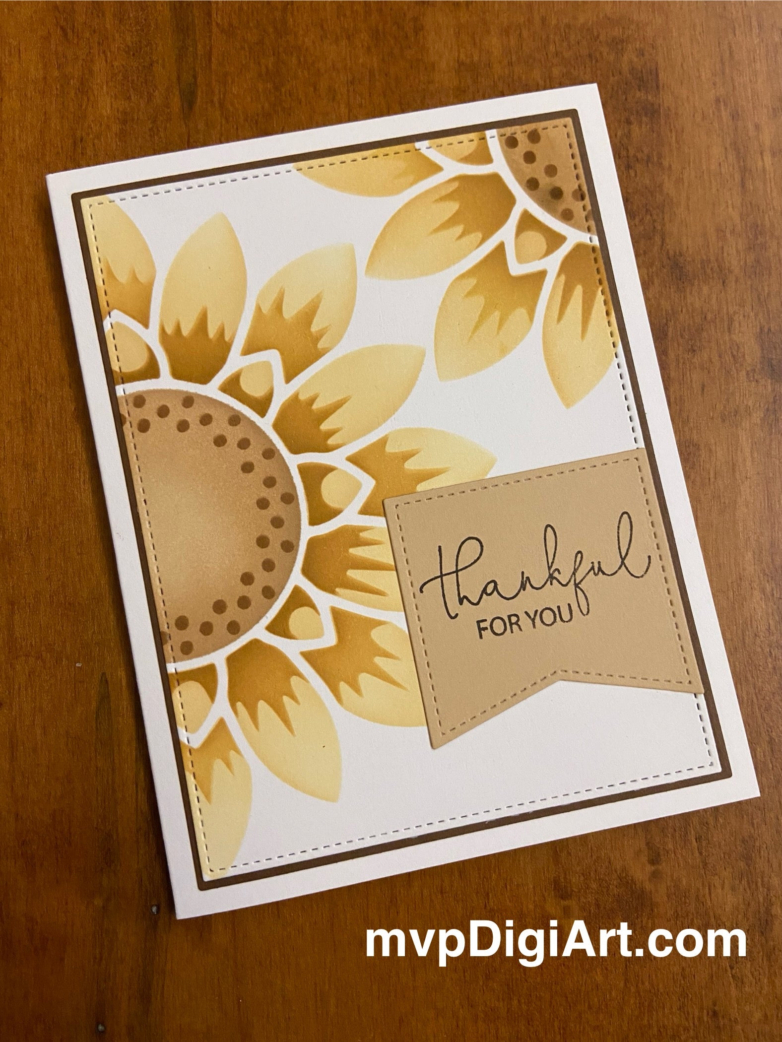 Handmade thank you card with two ink-blended sunflowers in warm yellow tones on white stitched panel, matted on charcoal brown cardstock with thankful for you sentiment on brown flag