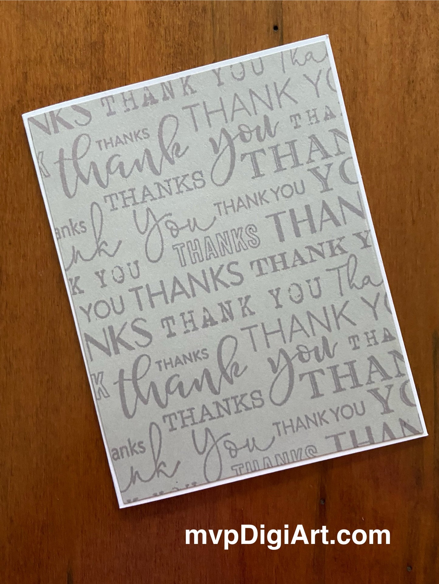 Front view of second card in the 2-pack showing elegant grey thank you card with multiple font styles