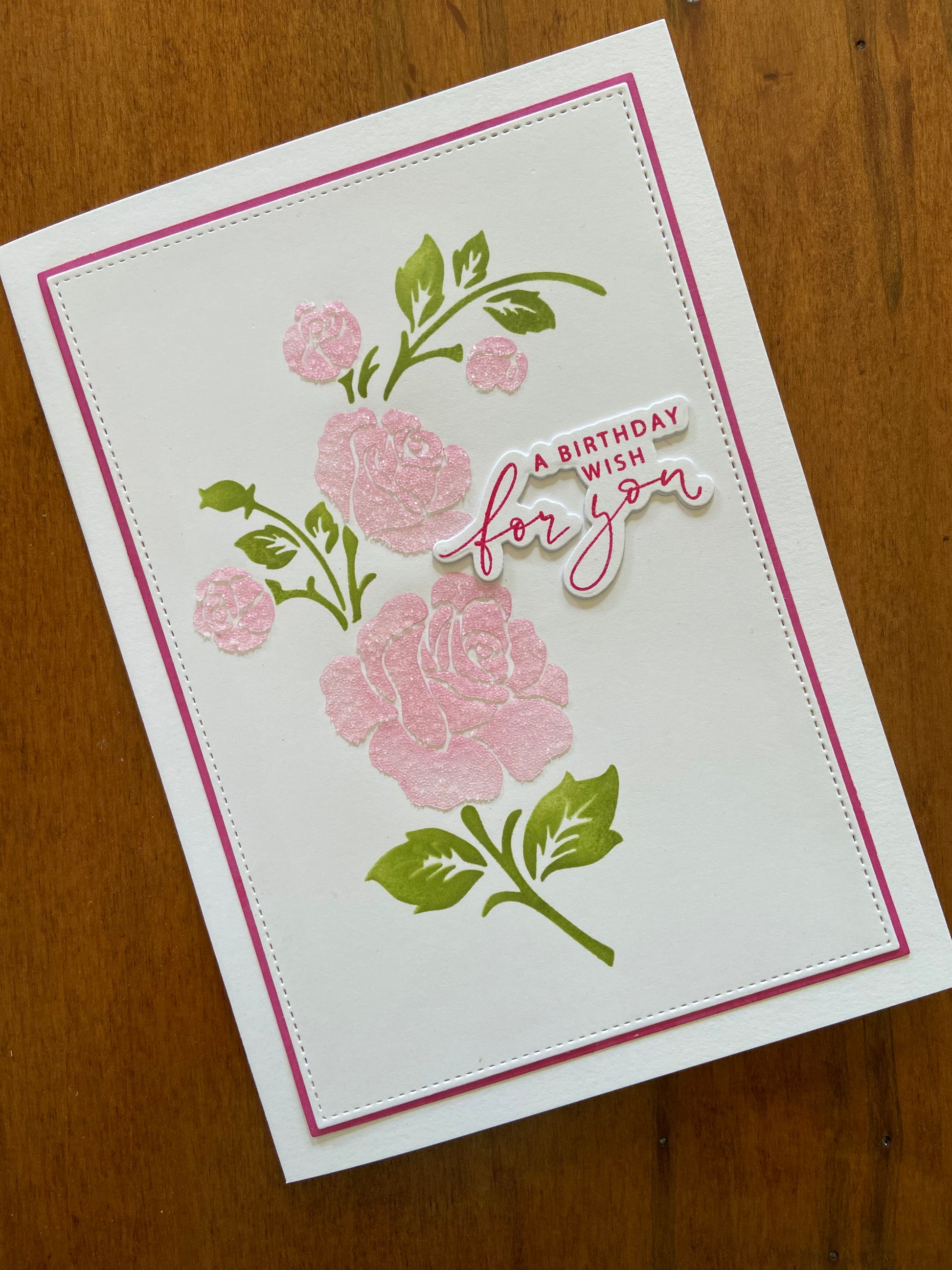 Pink Roses Birthday Wish for You handmade card. A rose stem of 4 pink roses and buds are stamped and then given some texture and sparkle with a special paste.