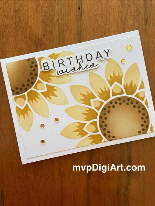Handmade birthday card with two vibrant sunflowers in yellow and orange with gold confetti embellishments on white background