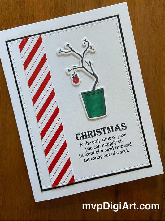 Handmade Christmas card featuring a coloured drawing of a 'Charlie Brown' tree with candy-cane stripes.