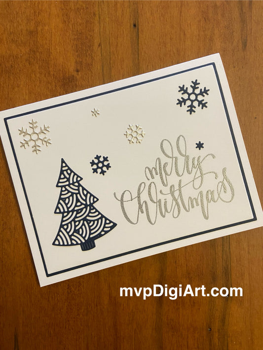 Handmade Christmas card with elegant navy blue filigree tree and silver snowflakes on white background