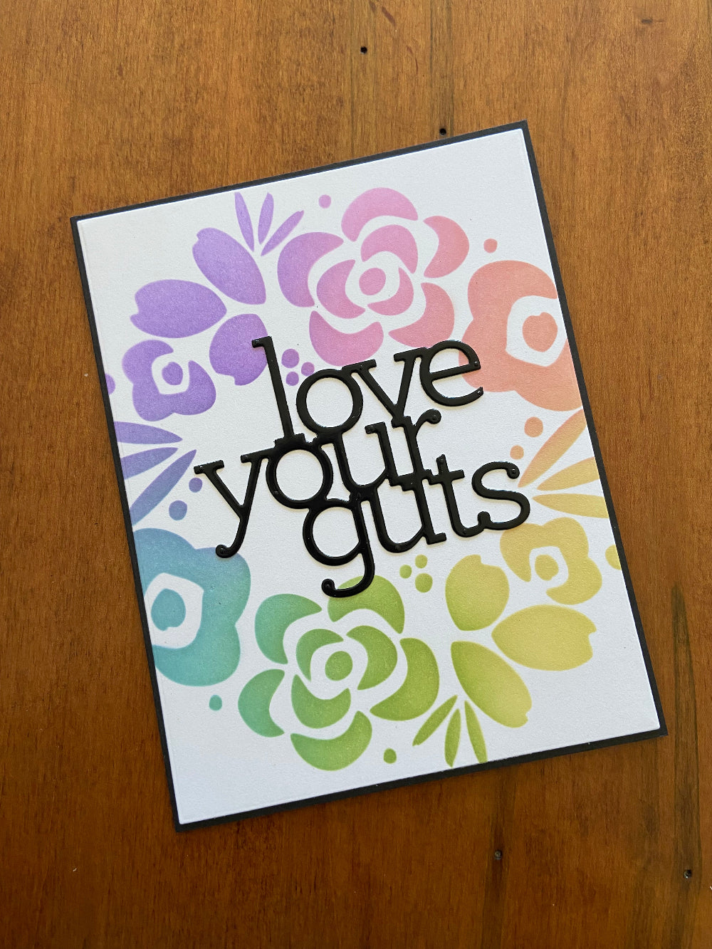 Handmade love card with 'Love Your Guts' sentiment and modern floral wreath design - front view