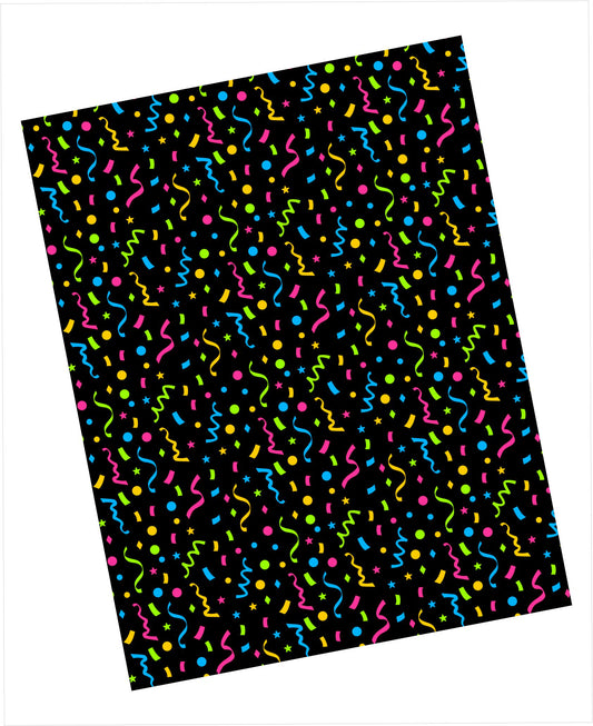 Cardstock with colourful confetti in pink, bright blue, yellow, and lime green scattered across a black background