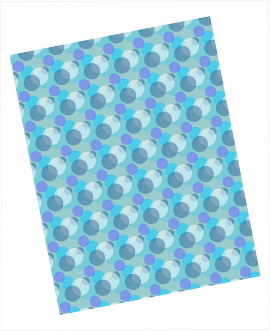 Cardstock with blue and green dots pattern on blue green background
