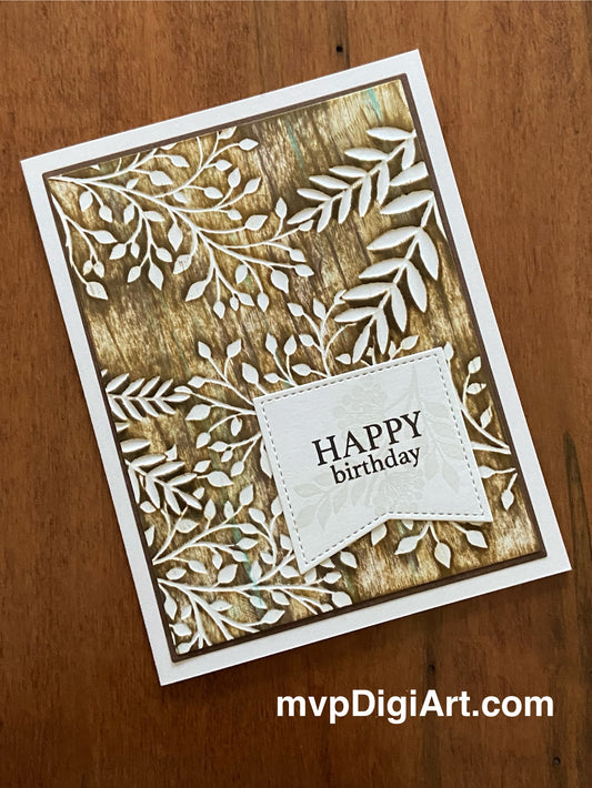 Handmade birthday card with a wood-like pattern and the text 'Happy Birthday' on it