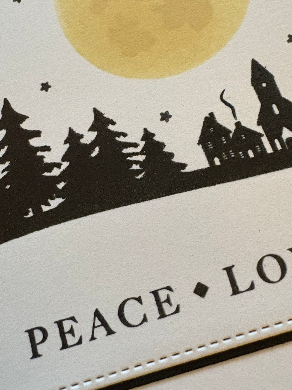 Christmas card with trees, moon, and stars to show detail.