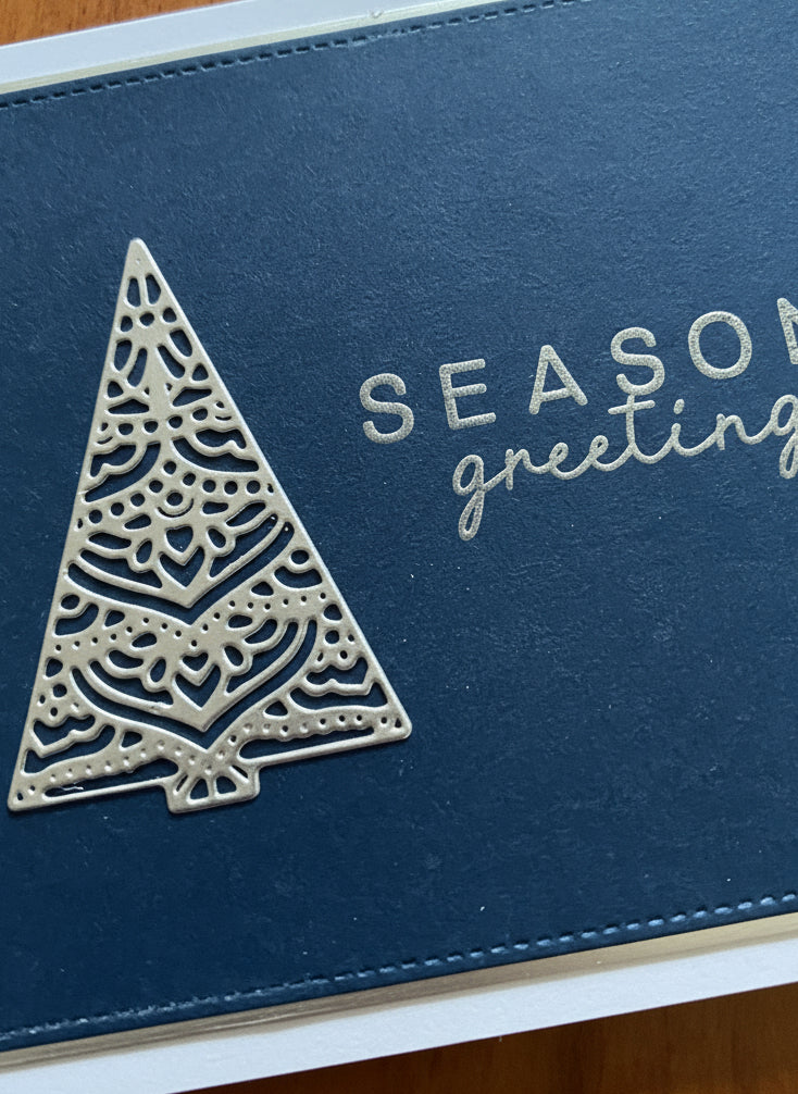 Closse up of the silver tree and card details