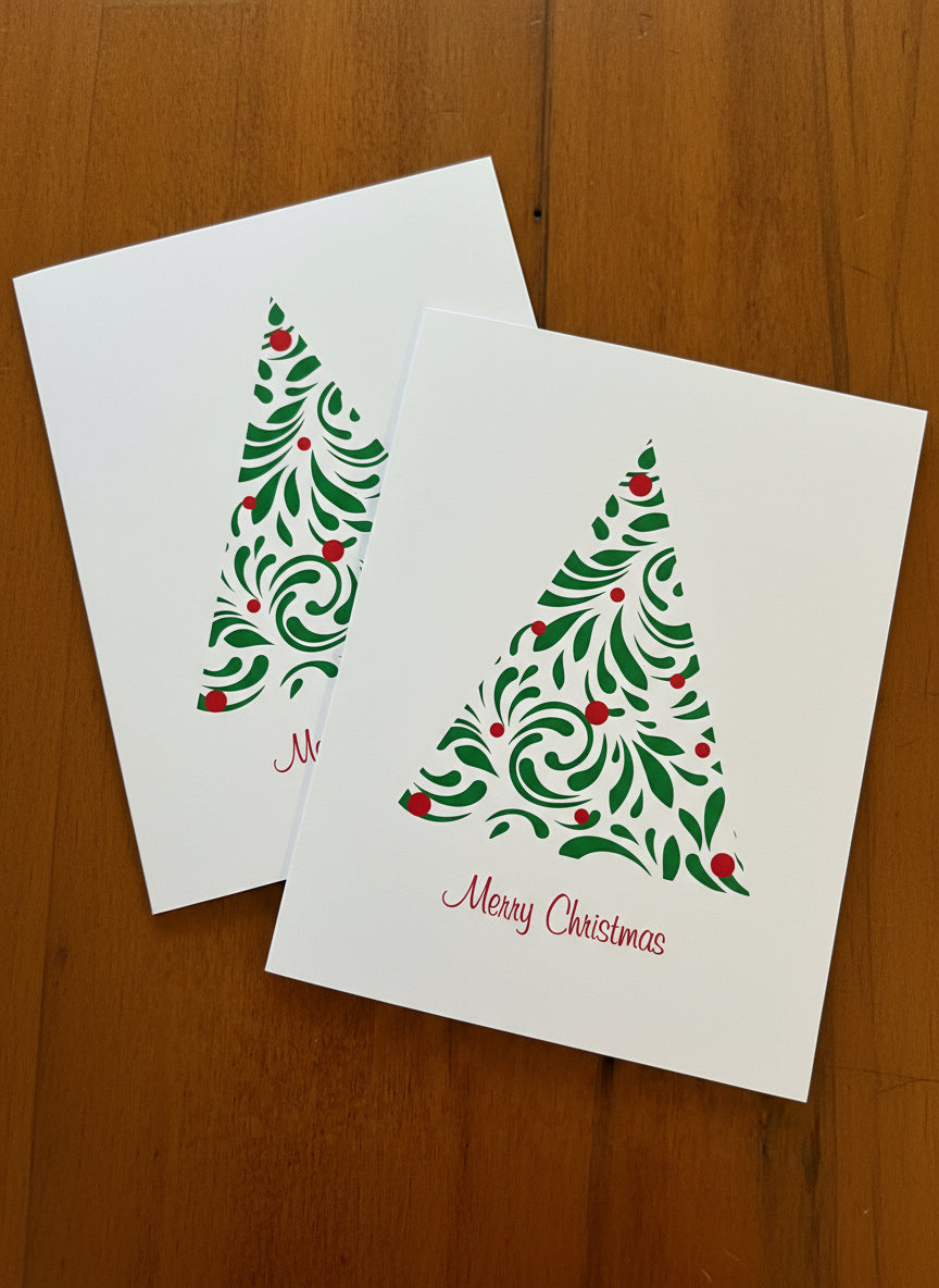 Set of 2 Christmas-themed greeting cards with a modern green tree with red balls design and text 'Merry Christmas' in red