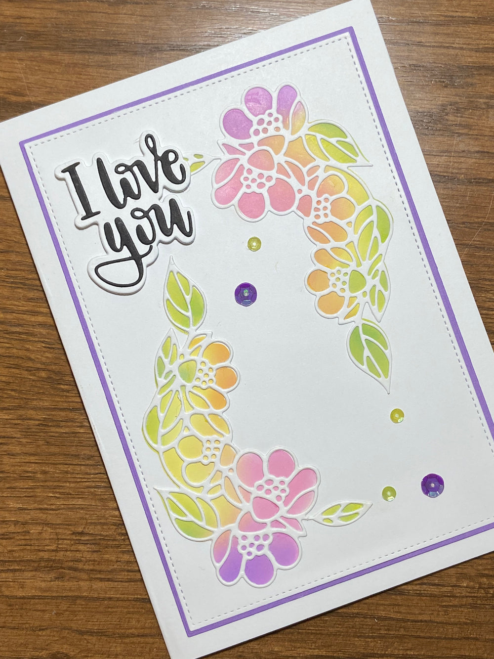 I love you 5x7 card showing ink blended floral cascades with die cut overlays for dimension.